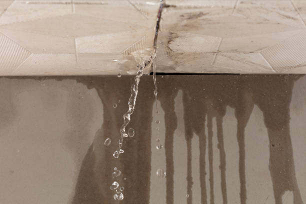 Professional Water Damage Restoration technician working in Pound, WI